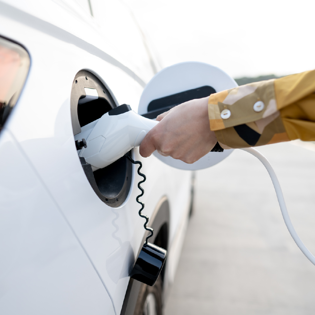 An electric vehicle is being charged