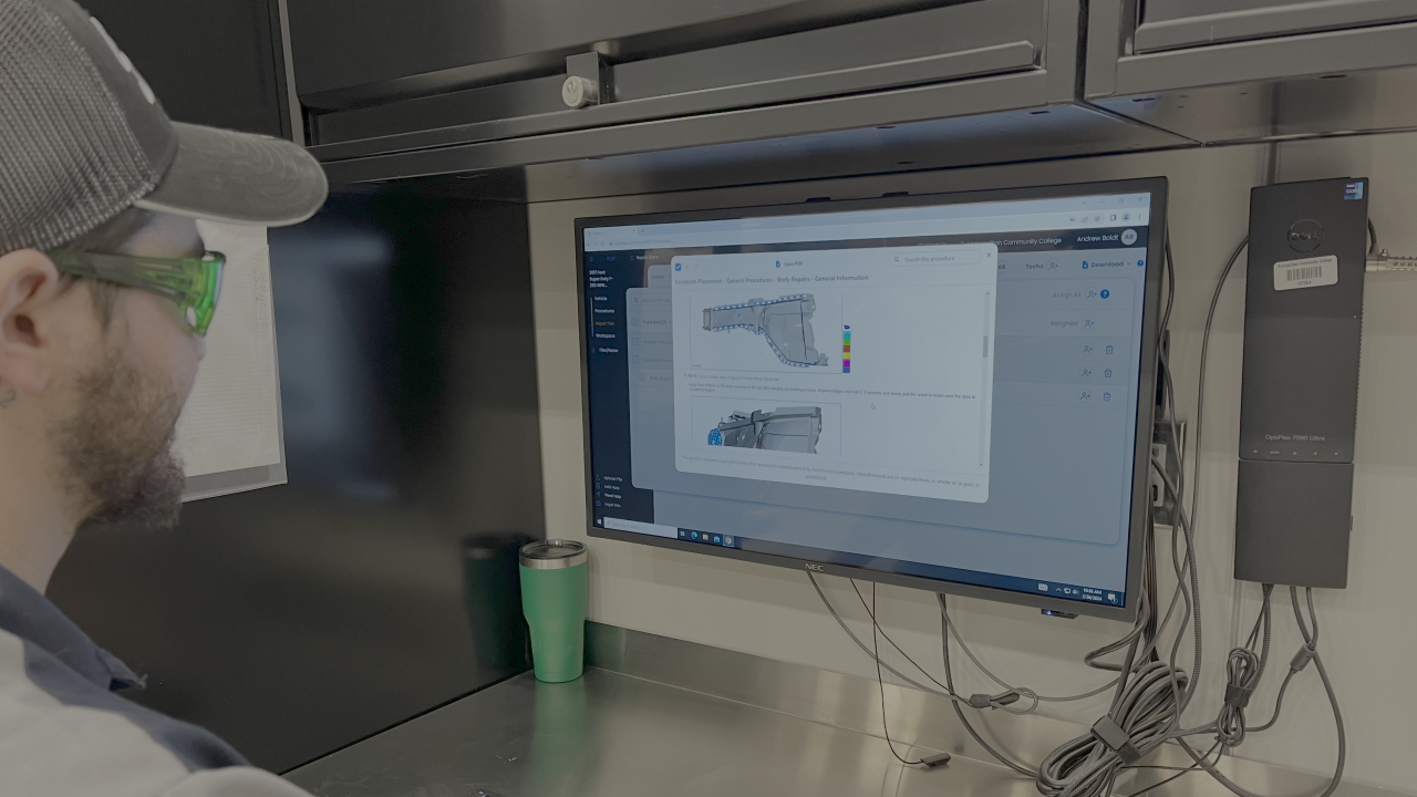 man looking at computer